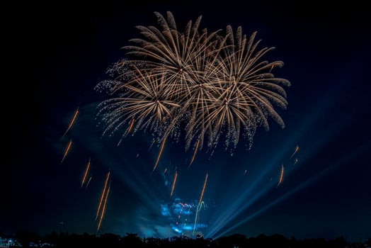 fireworks on the river in the dark sky photo
