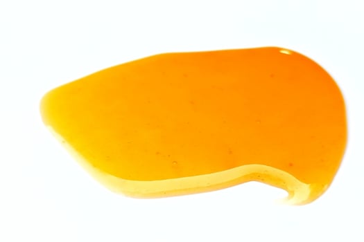 Honey isolated on white background photo