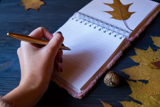 Hand writing in notebook. photo
