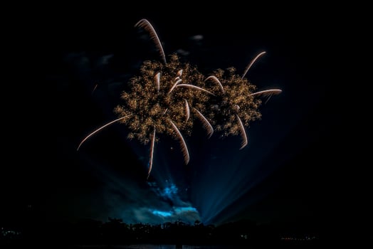 fireworks on the river in the dark sky photo