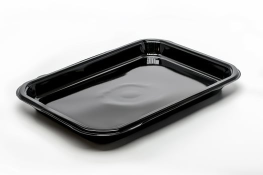 AI generated Black Empty Food Tray Isolated on White Background photo
