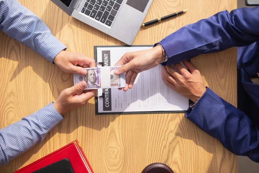 The concept of defendants in serious cases bribing officials involved in court decisions to change the course of case by giving bribes to facilitate the Lawyer team and prosecutors. bribery concept photo