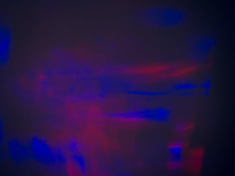 Light reflections at night on the wall in the dark for a party. photo