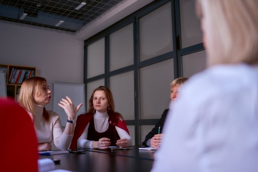 a women's team at a meeting in the office, bottom view photo