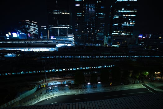 A night panoramic cityscape in front of Tokyo station wide shot photo