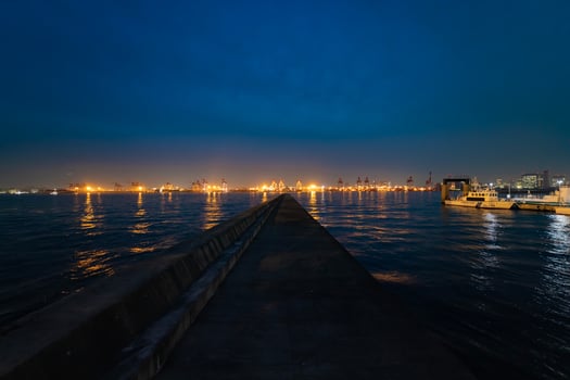 A dusk cityscape near the container port in Tokyo wide shot photo