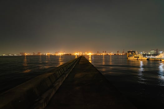 A dusk cityscape near the container port in Tokyo wide shot photo