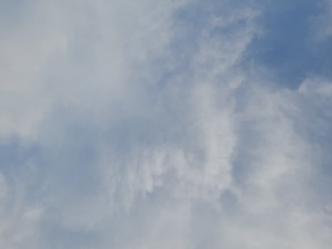 The white clouds on the blue sky are perfect for the background. Skyscape on Lombok Island, Indonesia photo