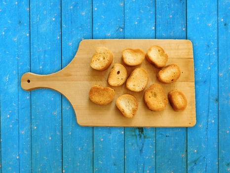 Bread On Wooden Background photo