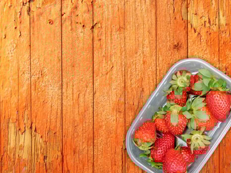 Strawberries On Wooden Background photo
