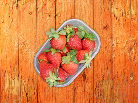 Strawberries On Wooden Background photo