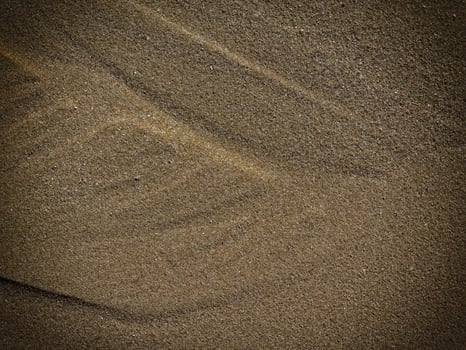 Texture Of Dark Sand At The Sea photo