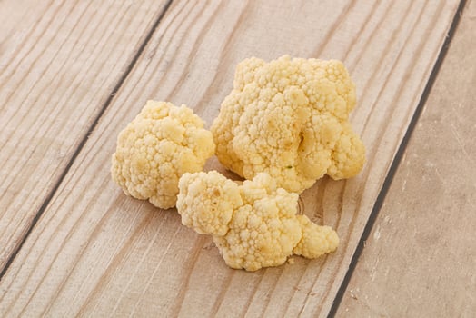 Raw white cauliflower cabbage heap photo
