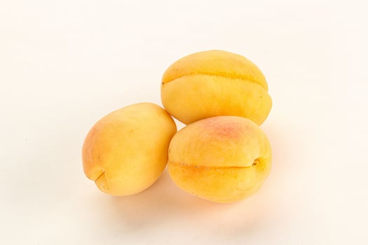 Ripe sweet juicy apricot heap photo