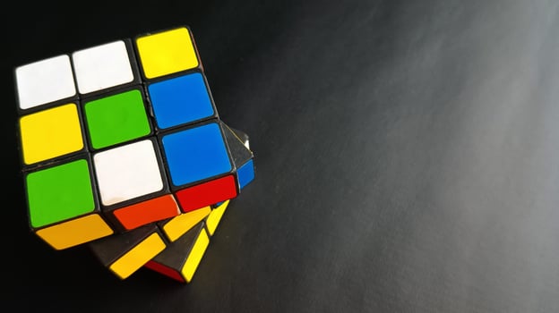 Rubik's cube on black background photo