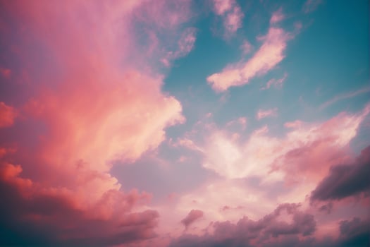 A beautiful sunset with clouds in the sky photo
