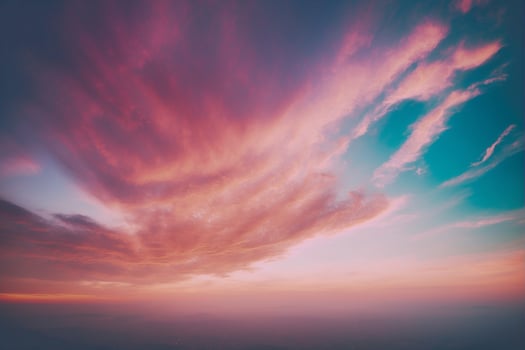 A beautiful sunset with clouds in the sky photo