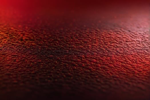 Red background with water droplets photo
