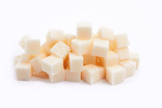 Sugar cube on white photo
