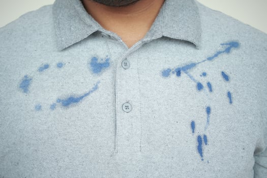 shirt with blue ink stain . photo
