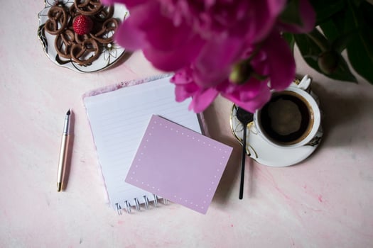 Coffee, empty paper and peony. Background with place for text. photo