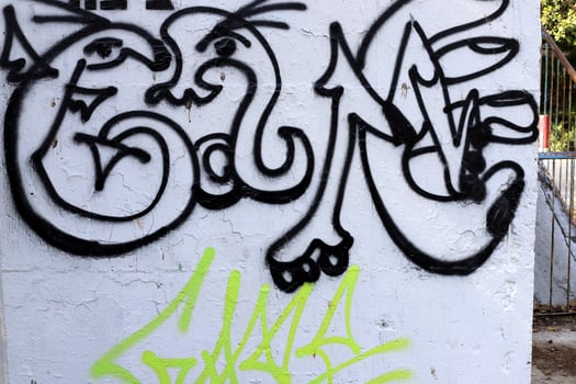 Tel Aviv Israel March 20, 2024. Colorful graffiti on the walls of houses in the city of Tel Aviv. photo