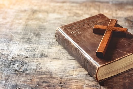 Spirituality, Religion and Hope Concept. Holy Bible Book and Cross. photo