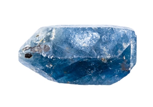 raw blue sapphire crystal isolated on white photo