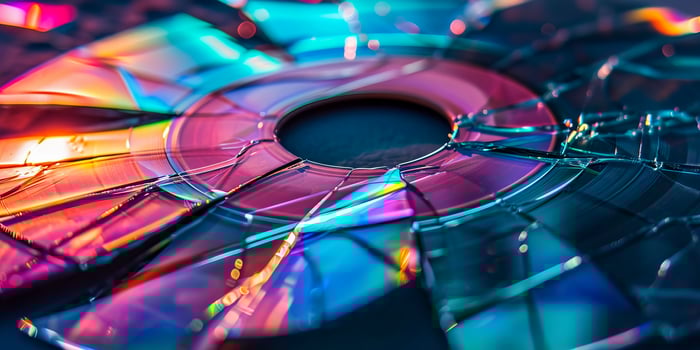 AI generated An array of broken CDs reflecting vibrant, iridescent colors, showcasing a beautiful play of light on shattered surfaces photo
