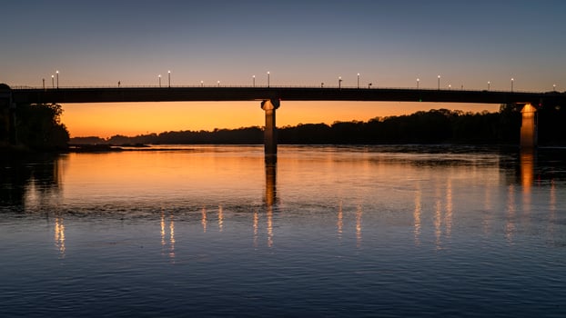 bridge over Missouri River at Hermann, MO, after sunset photo