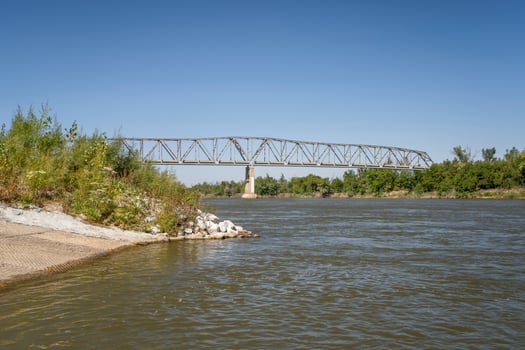 boat ramp and truss bridge over the Missouri River at Brownville, Nebraska photo
