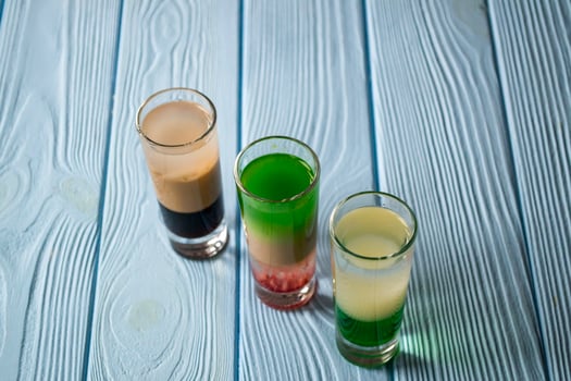 The alcohol shots on a table. photo