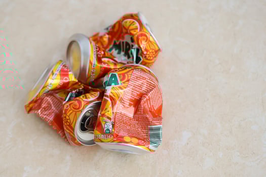 KYIV, UKRAINE - 4 MAY, 2023 Mirinda orange drink in orange citrus tin can with classic design and logo photo