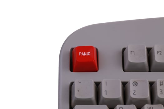 Red panic button on gray worn keyboard photo