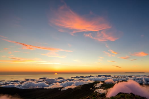 Beautiful Clouds Over the Mountains Create a Harmonious Atmosphere, Painting a Serene and Majestic Scene of Natural Beauty photo