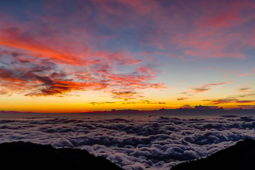 Beautiful Clouds Over the Mountains Create a Harmonious Atmosphere, Painting a Serene and Majestic Scene of Natural Beauty photo