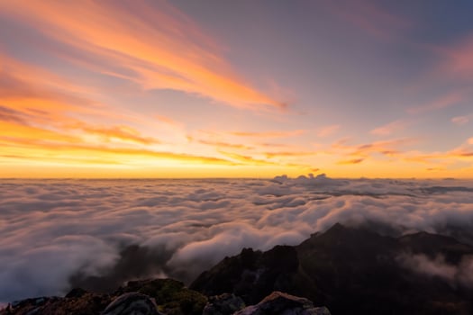 Beautiful Clouds Over the Mountains Create a Harmonious Atmosphere, Painting a Serene and Majestic Scene of Natural Beauty photo