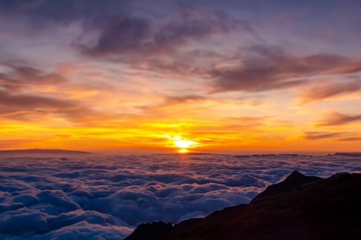 Beautiful Clouds Over the Mountains Create a Harmonious Atmosphere, Painting a Serene and Majestic Scene of Natural Beauty photo
