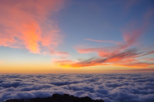 Majestic Sunrise Beautiful Clouds Over the Mountains Create a Harmonious Atmosphere, Painting a Serene and Majestic Scene of Natural Beauty photo