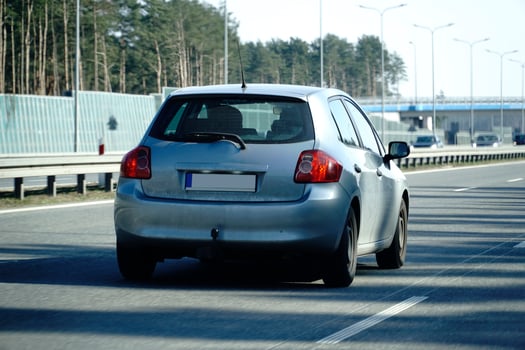 Car Drives on a Highway photo