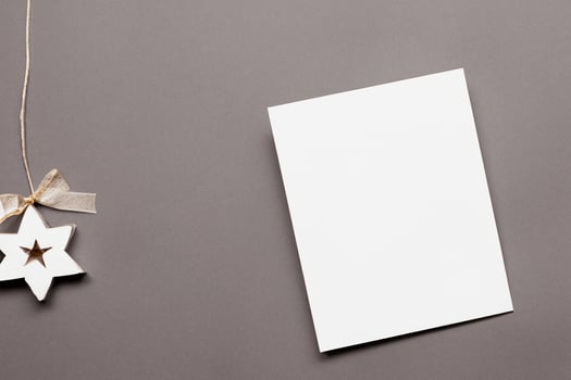 Beautiful Mockup White Card with Christmas Ornaments, A Festive Touch for Your Holiday Greetings photo