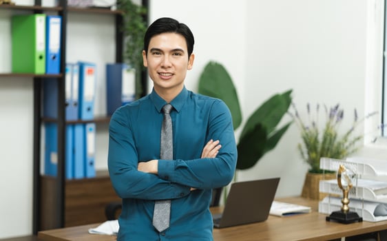 Image of Asian male businessman working in the office photo
