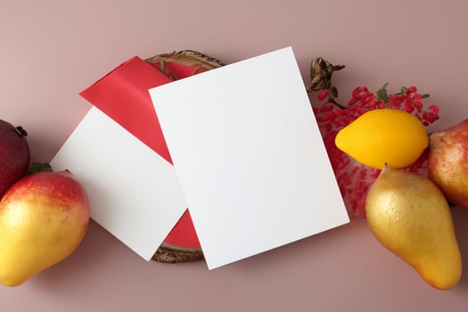 Card and White Paper Mockup Harmonized with Fresh Fruit, Crafting a Visual Symphony of Artful Design and Culinary Delight, Where Wholesome Ingredients Merge in a Feast of Vibrant Imagery photo