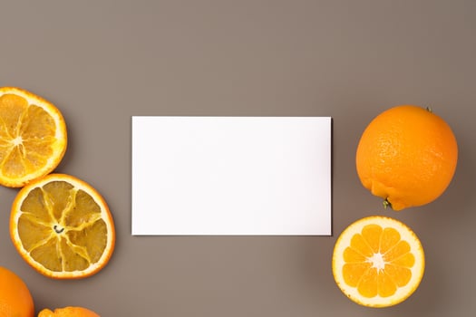 White Paper Mockup Enlivened by the Zesty Aura of Fresh Oranges, Crafting a Visual Symphony of Culinary Opulence and Wholesome Design photo