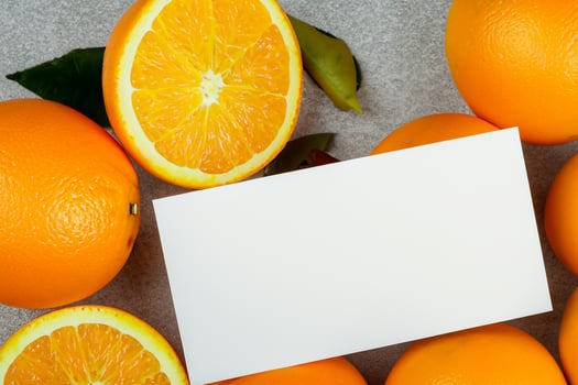 White Paper Mockup Enlivened by the Zesty Aura of Fresh Oranges, Crafting a Visual Symphony of Culinary Opulence and Wholesome Design photo