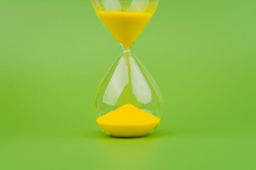 Hourglass, colorful countdown, time limit, time concept and importance of spending time. photo