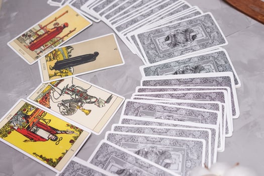 TVER, RUSSIA - FEBRUARY 18, 2024. Tarot cards, Tarot card divination, fortune telling. Occultism, esoteric education. photo