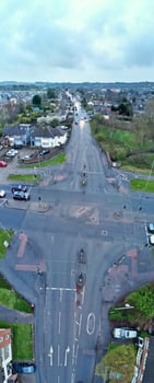 High Angle Panoramic View of Luton City during Cloudy and Rainy Sunset. Luton, England UK. March 26th, 2024 photo