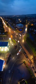 High Angle Panoramic View of Luton City during Cloudy and Rainy Sunset. Luton, England UK. March 26th, 2024 photo