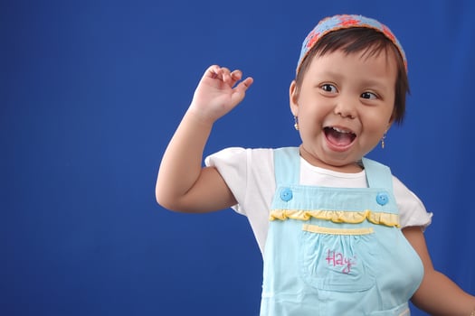 an Indonesian little girl wearing headband photo